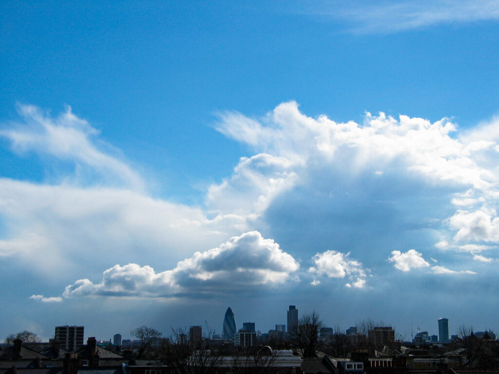 Tuesday 23 march - 15:36:36 pm. A perspective view on the City of London skyline from Hackney with the iconic buildings The Gherkin, Tower 42 and One Canada Square showcasing their iconic silhouettes.