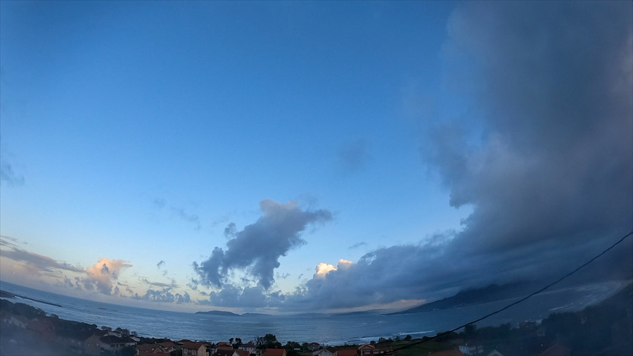 Evening panorama over Carnota Bay on the Costa da Morte with a towering cumulus congestus cloud above the sea, stratocumulus over Monte Pindo and the villages of Sofán, Caldebarcos and Cape Fisterra.